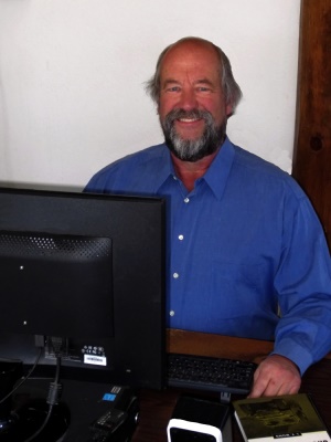 Tim Schreyer at his Computer